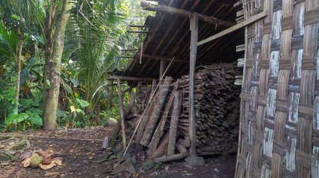Photo for Shack for Storing Firewood. Behind of Old House in the Village - Royalty Free Image