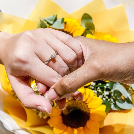 Photo for Marriage proposal with beautiful diamond ring and sunflowers. High quality photo - Royalty Free Image