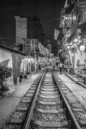Photo for Cafes on Train Street, Hanoi: Sip Coffee as Trains Roar By. High quality photo - Royalty Free Image