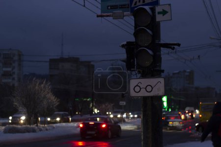 Photo for Blackout in Ukraine. Broken traffic light on Chornovola Avenue in Lviv. Blackout due to shelling of critical infrastructure. War in Ukraine. 11.12.2022 - Royalty Free Image