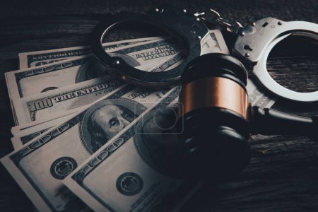 Photo for Hammer and money in court. - Royalty Free Image