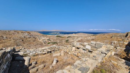 Photo for Delos Island, a jewel in the Aegean Sea, holds rich mythological and archaeological significance. Birthplace of Apollo and Artemis, its ancient ruins and sacred sites make it a UNESCO World Heritage treasure. - Royalty Free Image