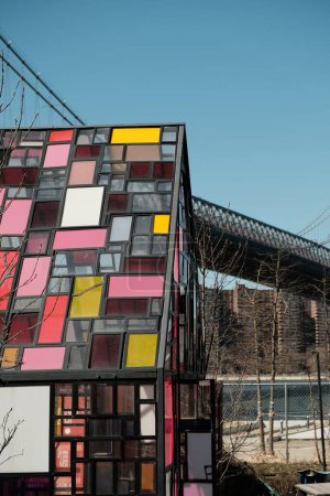 Photo for NEW YORK, NY - APRIL 29, 2015: Tom Fruins, Kolonihavehus, famous stained glass house in Brooklyn Bridge Park, NYC. High quality photo - Royalty Free Image