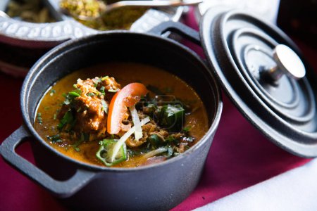 Foto de Mulligatawny is an Indian dish that is very similar to a soup. In Tamil the word 'mulligatawny' translates as watery pepper. - Imagen libre de derechos
