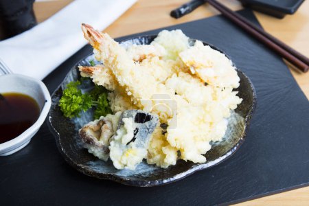 Japanese tempura with vegetables and seafood.