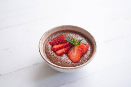 Photo for Chocolate mousse is a dessert of French origin, whose base is egg white mounted until stiff, or whipped milk cream, which give it a spongy consistency. - Royalty Free Image