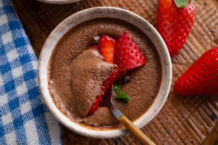 Chocolate mousse is a dessert of French origin, whose base is egg white mounted until stiff, or whipped milk cream, which give it a spongy consistency.