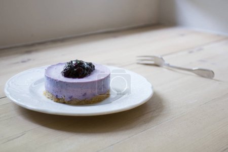 Photo for Blueberry mousse is a dessert of French origin, whose base is egg white mounted until stiff, or whipped milk cream, which give it a spongy consistency. - Royalty Free Image