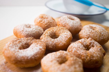 Photo for Traditional Spanish fried donuts made with lemon and cinnamon. - Royalty Free Image