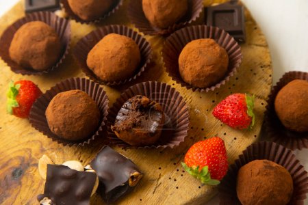 Premium quality chocolate truffles with strawberries.