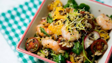 Photo for Delicious rice salad with prawns and spinach - Royalty Free Image