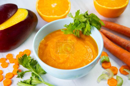 Photo for Cold carrot and mango soup. - Royalty Free Image