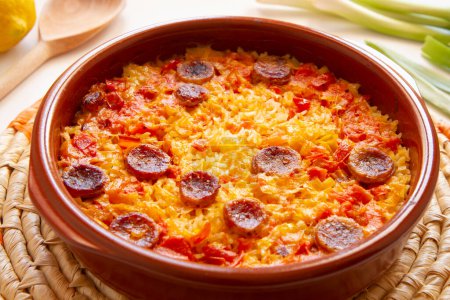 Photo for Baked rice with chorizo. Traditional Spanish paella recipe. - Royalty Free Image