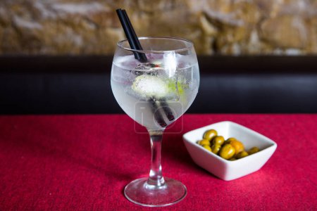 Photo for Gin and tonic served in a balloon glass - Royalty Free Image