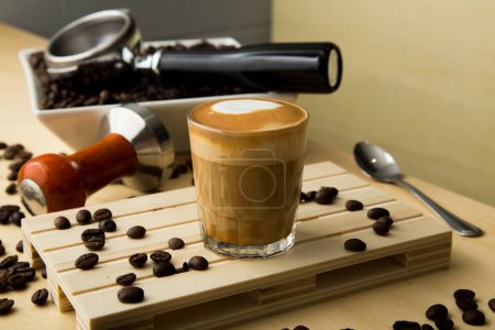 Photo for Barista preparing a delicious organic coffee. Flat white or cortado coffee. - Royalty Free Image