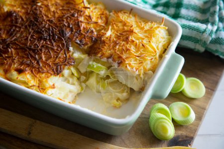 Photo for Baked leek pie gratin with cheese. - Royalty Free Image