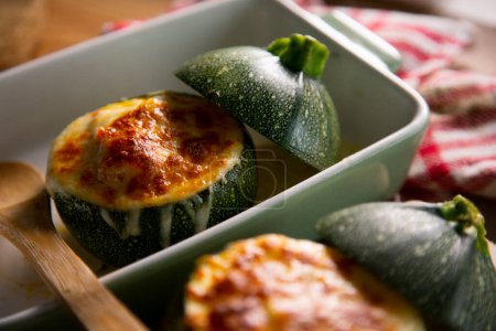 Photo for Zucchini stuffed with meat and baked in the oven. Traditional Spanish tapa recipe. - Royalty Free Image