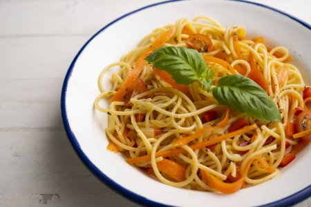 Photo for Noodles with carrot cut into strips. Traditional Italian recipe. - Royalty Free Image