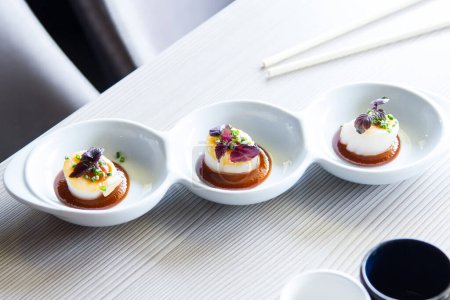 Photo for Grilled scallop with miso sauce in a Japanese restaurant in Tokyo - Royalty Free Image