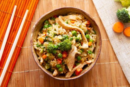 Photo for Fried rice three delicacies with prawns, peas, omelette and other vegetables. - Royalty Free Image