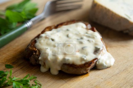 Photo for Top quality beef tenderloin served with mushrooms and cheese sauce. - Royalty Free Image