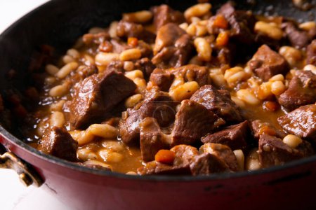 Photo for Beef stew with carrot, onion, potato and white beans. - Royalty Free Image