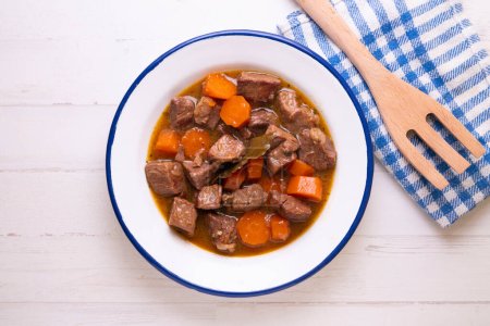 Photo for Beef stew with carrot, onion, potato and other vegetables. - Royalty Free Image