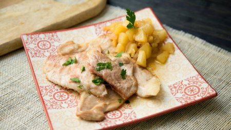Photo for Baked pork loin cooked with pears. - Royalty Free Image