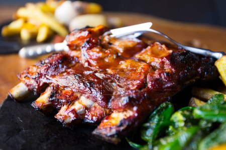 Photo for Baked pork ribs cooked at low temperature. - Royalty Free Image