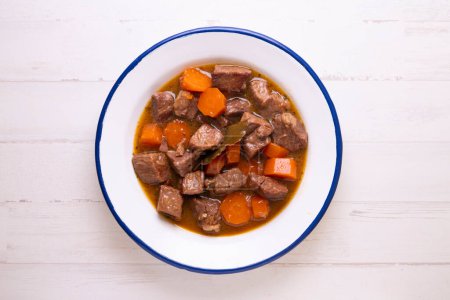 Beef stew with potatoes, carrots and other vegetables.