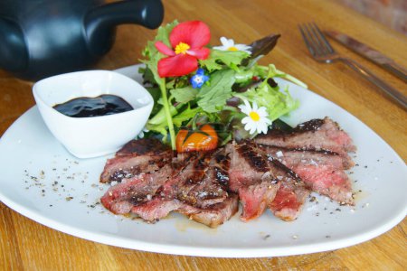 Photo for Top quality ribeye steak in a Spanish restaurant. - Royalty Free Image