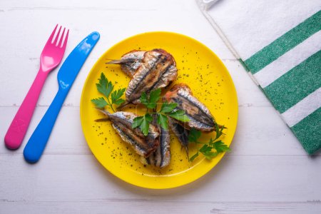 Photo for Fried stuffed anchovies. Traditional tapa from the city of Malaga in Spain. - Royalty Free Image