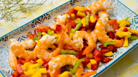 Photo for Prawns with mango and very small chopped vegetables. - Royalty Free Image