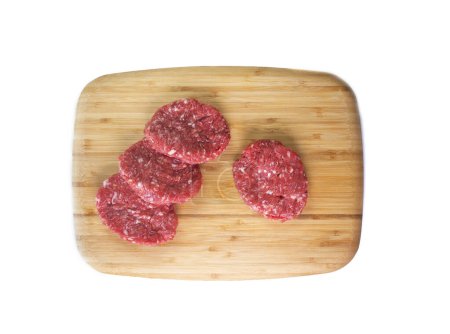 Photo for Premium burger beef on wood base on a white background. - Royalty Free Image
