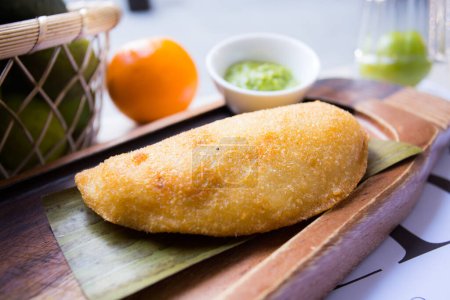 Photo for Argentinian empanada stuffed with spinach and cheese - Royalty Free Image