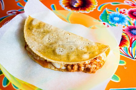 The quesadilla is a Mexican dish that consists of a corn or wheat tortilla, folded in half, which, depending on the region, can be filled with cheese or other ingredients.