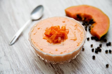 Photo for Yogurt with papaya and honey in a Latin American restaurant. - Royalty Free Image