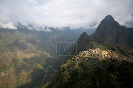 Photo for Panoramic view from Machu Picchu mountain. Views of the ancient Inca city of Machu Picchu in the Sacred Valley in Peru with the Huayna Picchu mountain - Royalty Free Image