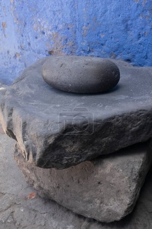 Photo for Batan is a lithic object used to grind food in Peru and western Bolivia. - Royalty Free Image