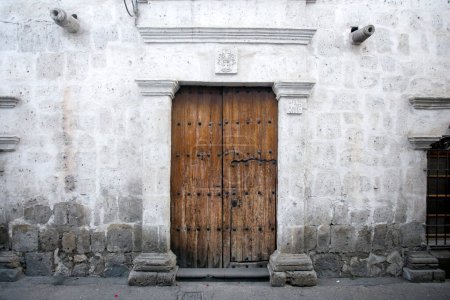 Photo for White walls and doors of the old streets of the city of Arequipa in Peru. - Royalty Free Image