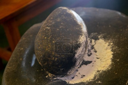 Photo for The Peruvian fulling stone or maray is a lithic object used to grind food in Peru. - Royalty Free Image