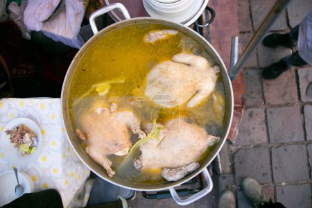 Photo for Caldo de Gallina. Chicken broth is a traditional dish of Peruvian gastronomy - Royalty Free Image