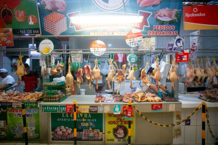 Photo for Lima, Peru; 1st January 2023: Food stall selling meat in the Surquillo market in Lima, Peru. - Royalty Free Image