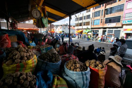 Photo for Puno, Peru 1st January, 2023: Street food stall with fruits and vegetables in the city of Puno next Titicaca Lake. - Royalty Free Image