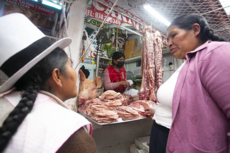 Photo for Cusco, Peru; 1st January 2023: Stall selling meat in the central market of Sant Jernimo de Cusco in Peru. - Royalty Free Image
