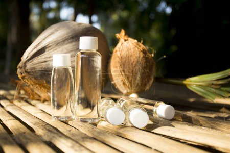 Photo for Bottles of organic oil made from coconut in Thailand. - Royalty Free Image