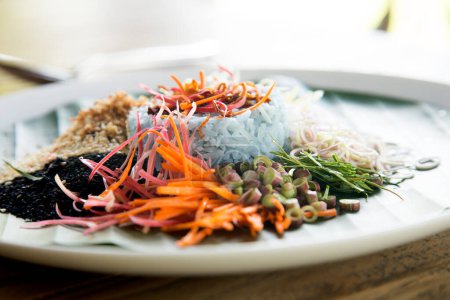 Photo for Khao Yam is a southern Thai rice salad served with various local ingredients. - Royalty Free Image