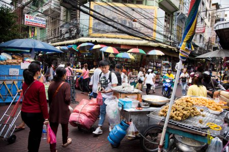 Photo for Bangkok, Thailand; 1st January 2023: Street food restaurant in a busy street in Bangkok. - Royalty Free Image