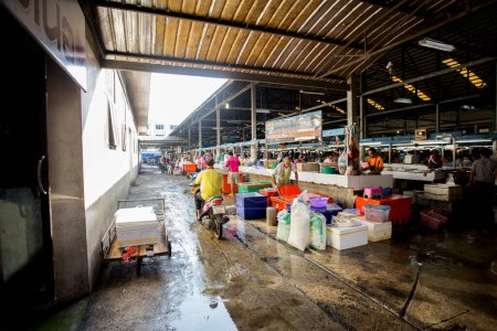 Photo for Krabi, Thailand; 1st January 2023: Sellers and buyers at the Krabi fresh fish market. - Royalty Free Image