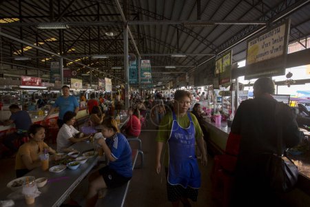 Photo for Krabi, Thailand; 1st January 2023: Sellers and buyers at the Krabi fresh fish market. - Royalty Free Image